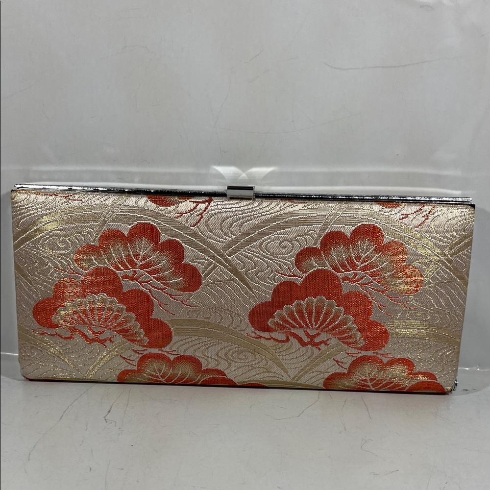 Elegant Gold and Red Clutch